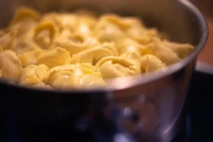 A pot of perfectly cooked pasta showing the ideal al dente texture after following the best way to cook pasta.