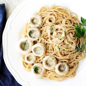 One-Pan Creamy Mushroom Pasta topped with fresh parsley and Parmesan cheese